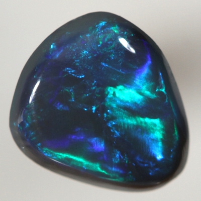 SOLID BLACK OPAL Bright golden green in a Flame pattern